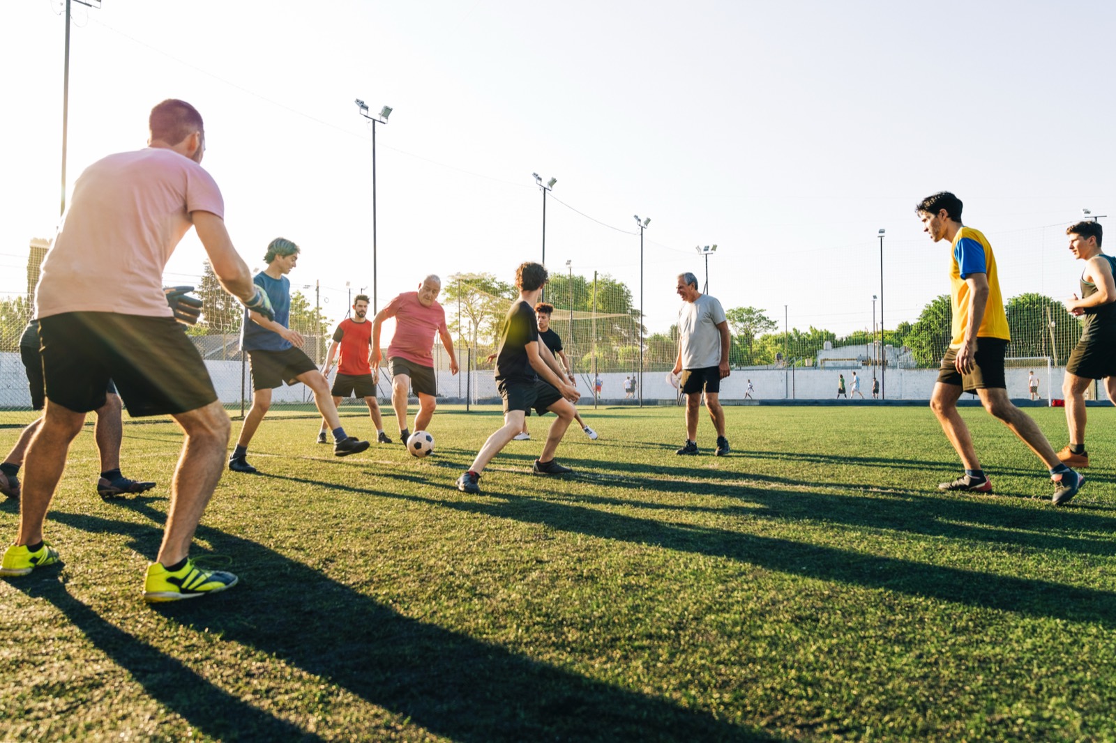 Athletes playing amateur football, the kind of active people AVA Orthopaedics' online sports injury clinic assesses