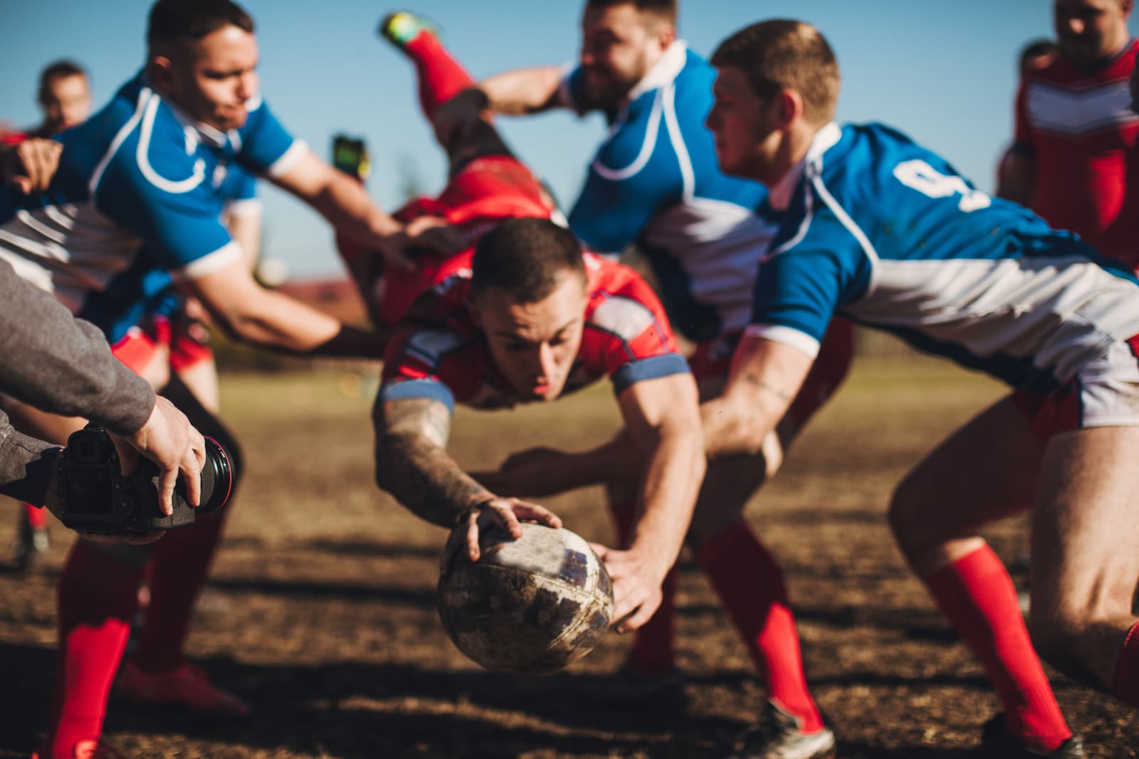 Rugby players in a rough tackle